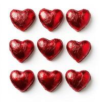 Chocolate heart candies arranged in a grid perfect for celebrations or gifting on special occasions photo