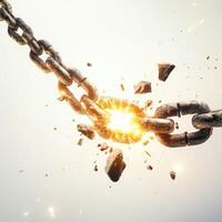 Chain breaking with explosion effect creating a dramatic visual impact in a simple background photo