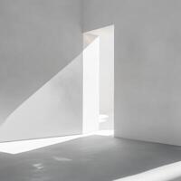 Light streams through an open doorway illuminating a minimalist interior space with white walls and smooth flooring photo