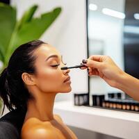 Makeup application in a stylish beauty salon with a focus on eyelash enhancement photo