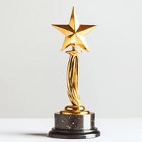 Shiny gold star trophy on a black base showcasing achievement and recognition photo