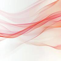 Soft flowing red and pink fabric ripples gracefully on a white background showcasing delicate movement and texture photo