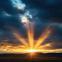 Dramatic sunset rays illuminate the sky over rolling hills during a tranquil evening photo