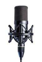 High-quality microphone set up for recording vocals in a professional studio environment during a music session photo