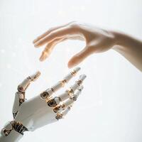 Human and robotic hands nearing connection in a symbolic representation of technology and humanity photo