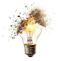 Light bulb shatters into sparks and fragments, revealing bright explosion in a creative display of energy photo