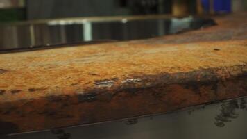This close up highlights a rustic surface of metal and wood, showcasing its design and texture. Stock Clip video