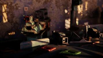 Abandoned workshop with tools and sunlight casting shadows on the walls video