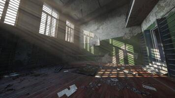 Abandoned gymnasium with sunlight filtering through broken windows video