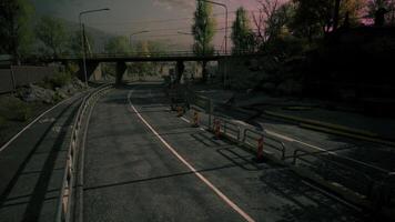 Abandoned road and bridge set against a dusky sky during twilight video