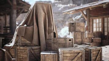 Abandoned wooden crates covered with a tarp in a deserted western settlement video