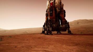 Martian base during a sunset with a landing spacecraft on the surface video