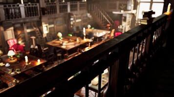 Old library filled with cozy reading spaces and soft candlelight video