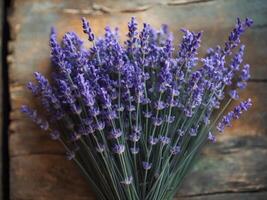 Freshly Gathered Lavender Bouquet on Rustic Wooden Surface for Aromatherapy Use photo