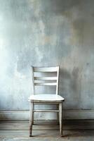 Vintage Wooden Chair Against Rustic Textured Wall in Minimalist Interior Setting photo