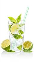 A refreshing iced drink with lime and mint isolated on a white background. photo