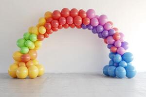 Colorful Rainbow Balloon Arch Against White Wall in Minimalist Interior Setting photo
