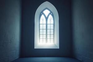 A window in a dark room with a blue wall photo