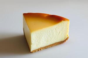A slice of cheesecake with a crust photo