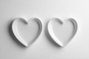 Minimalist White Heart-Shaped Plates on Clean Background for Elegant Dining and Home Decor Concepts photo