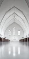 A large, empty church with white walls and a high ceiling photo