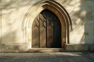 The archway of a building is made of stone and has a wooden door photo