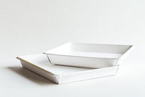 Two white trays with a gold border photo