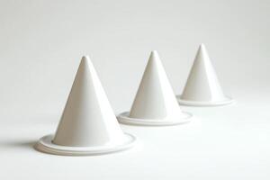 Minimalist Composition of Three White Geometric Cones on a Clean Background photo