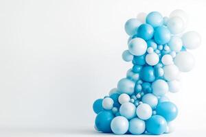 A bunch of blue and white balloons photo