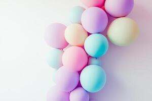 Colorful Pastel Balloons Against a Soft White Background photo