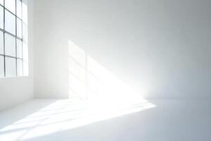 A room with a window and a white wall photo