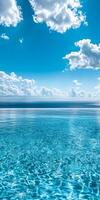 A body of water with a blue sky above it photo