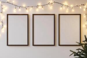 Minimalist Interior with Three Blank Picture Frames and Festive String Lights on a Neutral Wall photo
