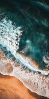 The ocean is calm and the waves are small. The water is blue and the sky is clear photo