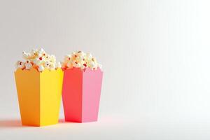 Two vibrant popcorn boxes, one yellow and one pink, filled with popcorn against a minimalist background. photo