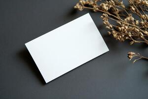 Minimalist Blank Business Card Mockup on Dark Background photo