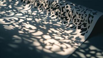 Intricate Paper Cut Art Casting Decorative Shadows on a Surface in Soft Ambient Light photo