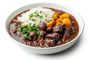 Delicious Brazilian Feijoada with Rice and Vegetables in Bowl photo