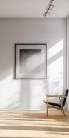 A serene and minimalist interior gallery space featuring a framed artwork, clean lines, and natural light streaming in, perfect for showcasing art and relaxation. photo