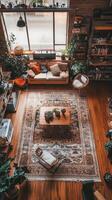 A living room with a couch, a coffee table, and a rug photo