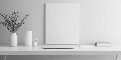 A white desk with a white computer monitor, a white book photo