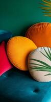 A couch with a green background and a bunch of pillows on it photo