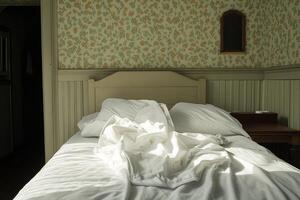 Cozy and Inviting Bedroom with Soft Sunlight and Crumpled Bedding photo