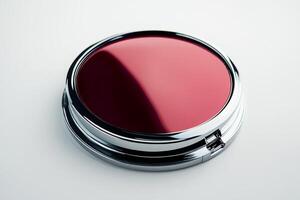 Bright Red Cosmetic Compact with Reflective Lid on Light Background photo