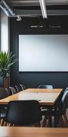 A large white board is on the wall of a conference room photo