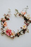 Floral Heart Wreath on White Background Featuring Pink and White Blossoms photo