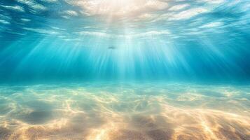 Beautiful blue ocean with a bright sun shining down on the water photo