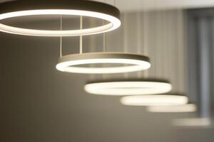 A row of white lights hanging from the ceiling photo