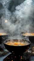 Steaming Bowls of Soup with Aromatic Steam on a Dark Background photo
