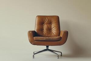 A brown leather chair with a white background photo